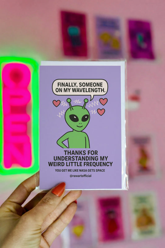 Cute green alien with hearts and wavy lines and text “Thanks for Understanding My Weird Little Frequency.”