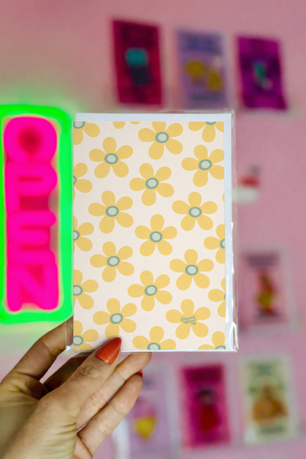 cream card with repeating yellow daisy flower pattern simple spring design