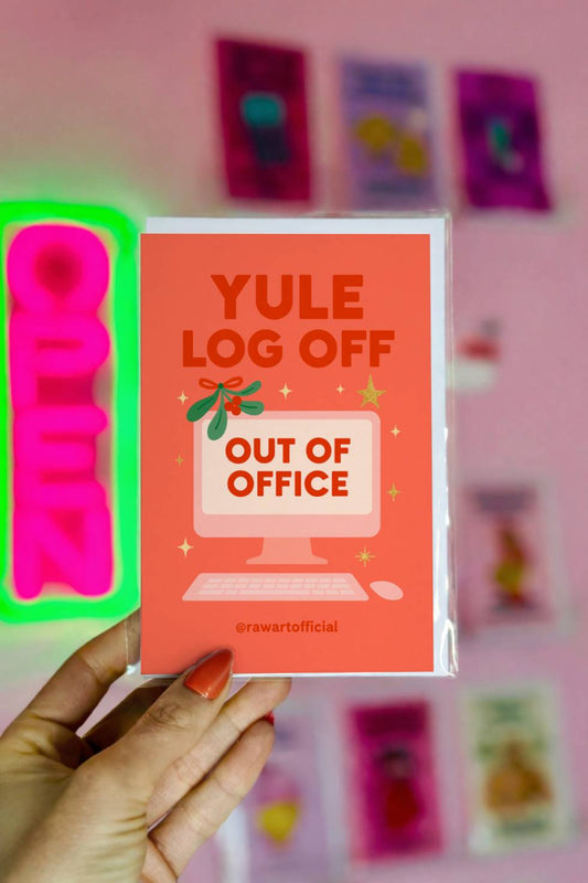 Funny Christmas greeting card showing a computer screen with an out of office message and the phrase “Yule Log Off.”